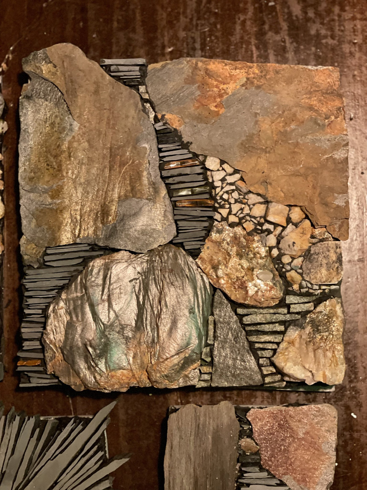 Finished slate mosaic panel made with our hand-split slate rods, rust slate and quartz