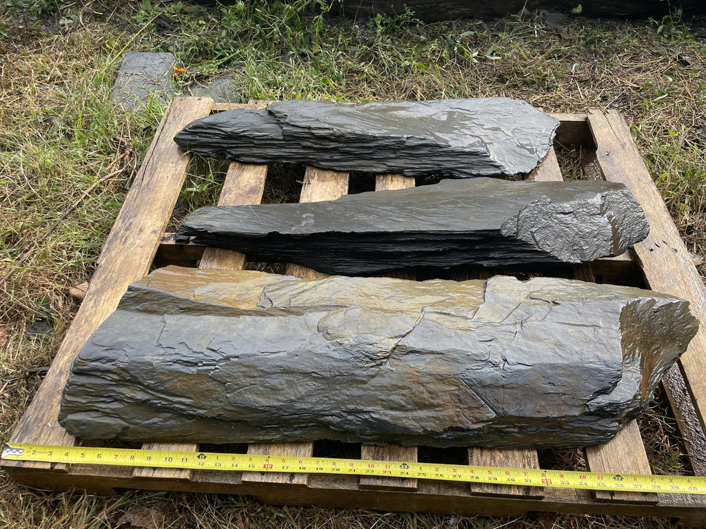 Hand-split Peach Bottom slate slabs with tape measure for size