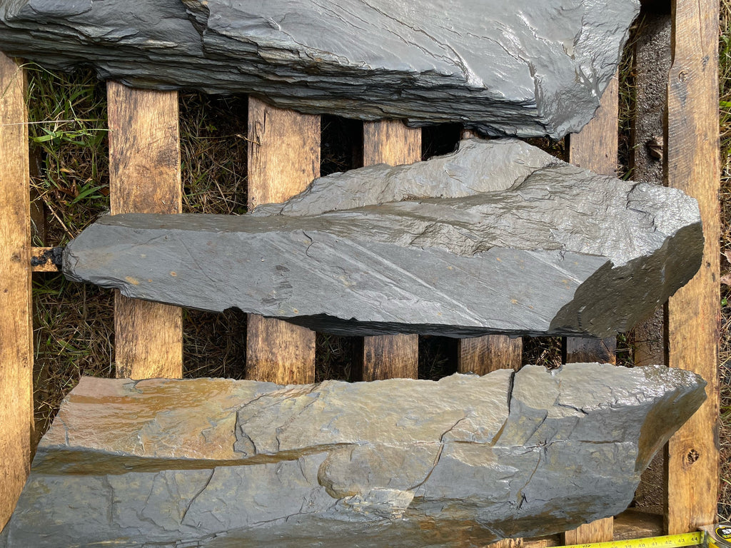 Large charcoal grey slate slabs, natural split faces