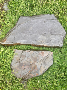 Two Natural Slate Steppingstones in grass